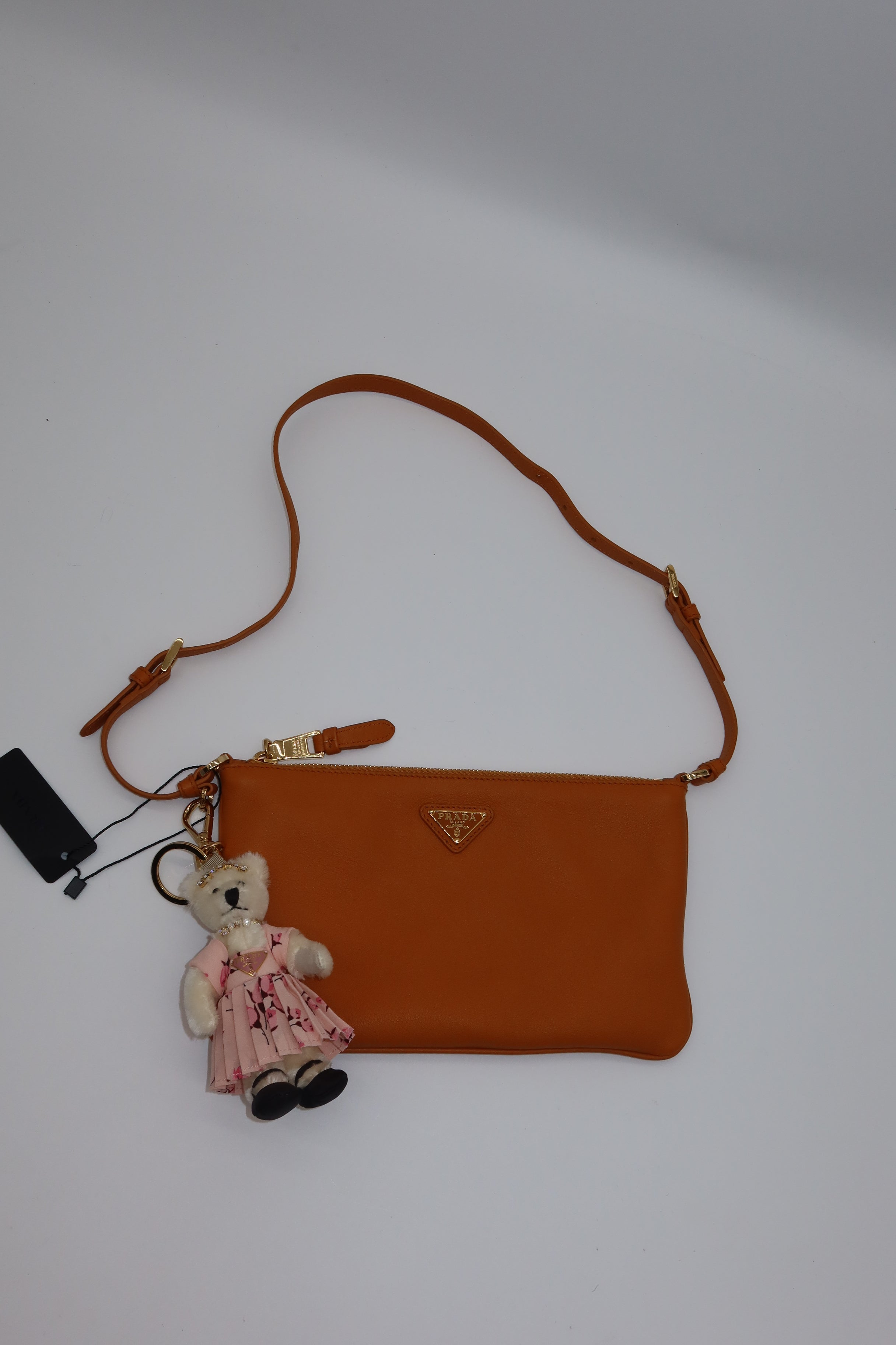 Prada - Amber leather pouch