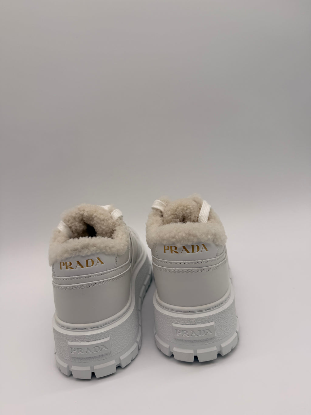 Prada White Leather Sneakers with Fur