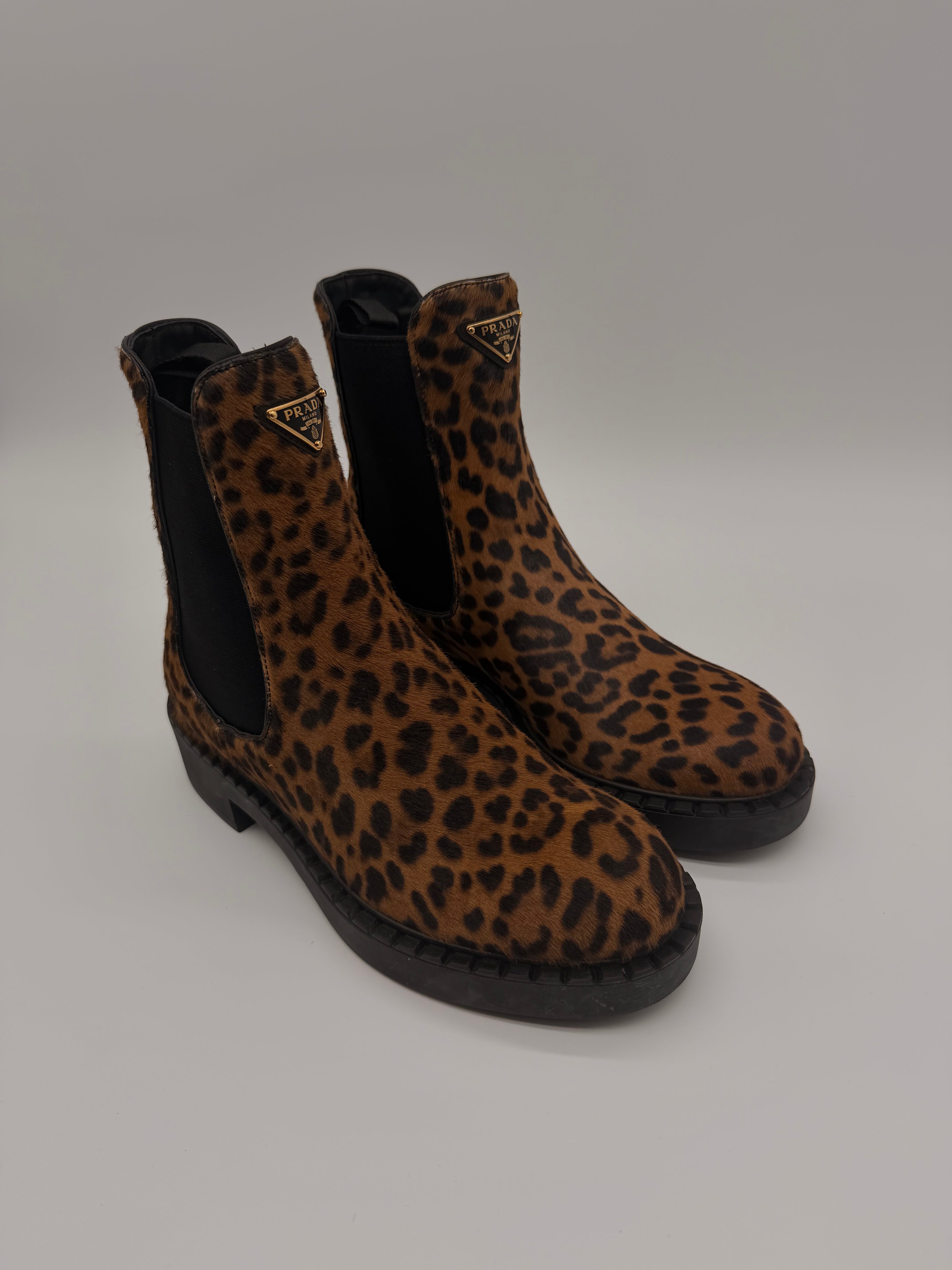Prada - Animal Print Boots